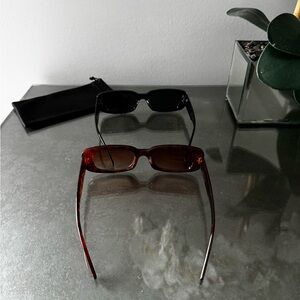 2 Pairs of Sunglasses